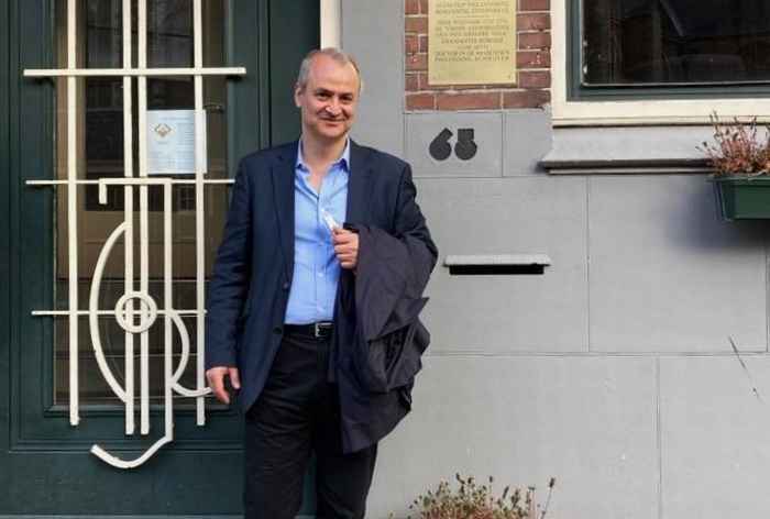 Alexander Kazamias in front of the former home of the Greek scholar Adamantios Koraïs